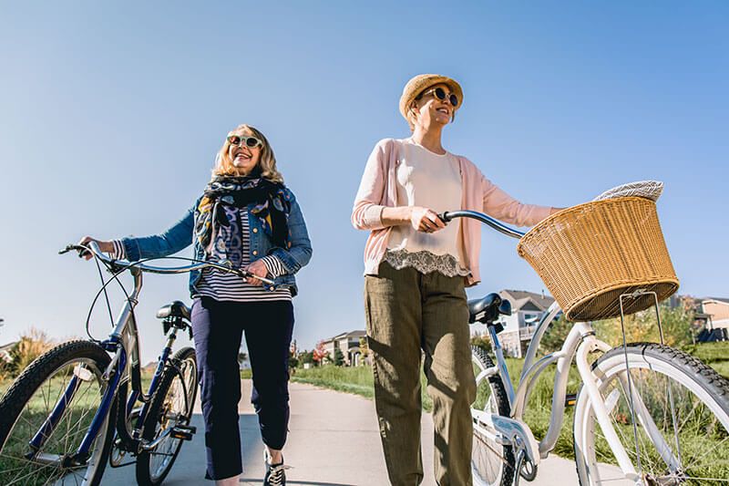 Residents biking in Inspiration community near Parker Colorado